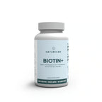 Flesje Naturecan Biotin+ op een witte achtergrond