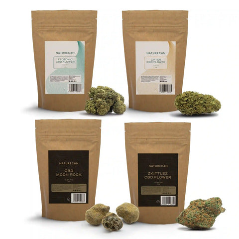 CBD Bloemen - Ontdekkingsbundel met vier bruine zakken, elk met een uniek label en CBD-bloemen ervoor.