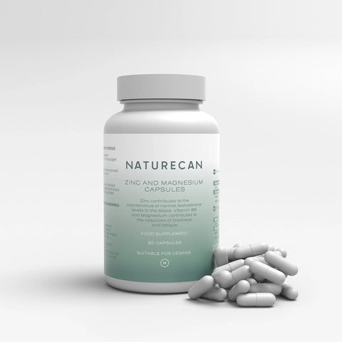 Zink en Magnesium Capsules in een witte fles met een groen label, vergezeld door losse capsules.